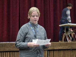 Student presenting a plank at the Youth in Government Platform Convention.