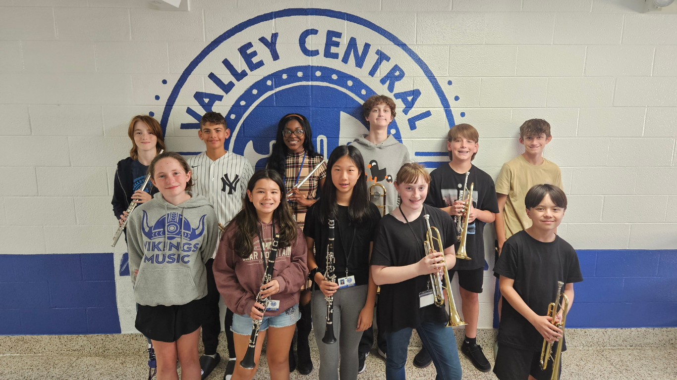 Group of  VCMS students holding instruments.