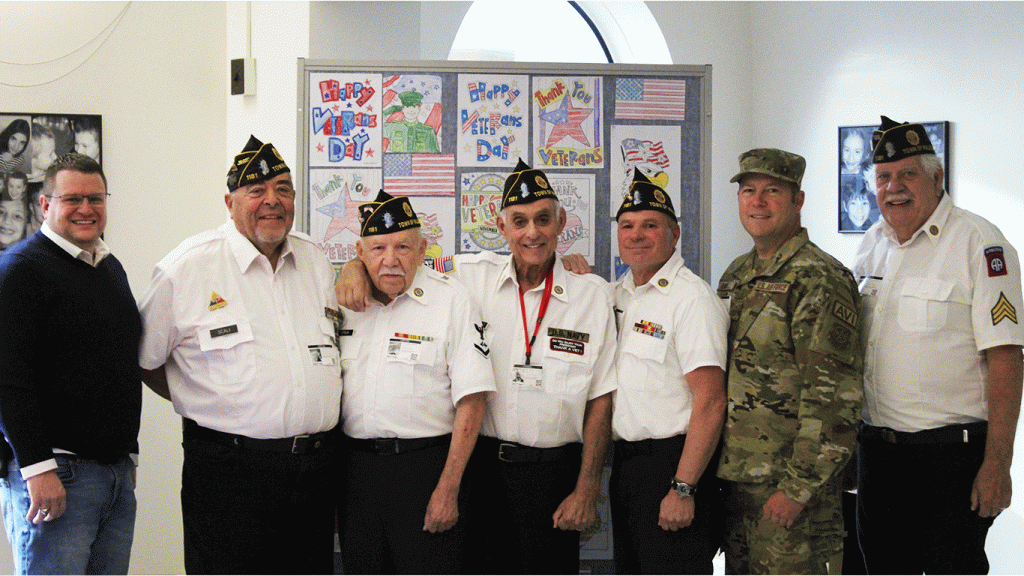  (L to R) Dan McDonald, principal of East Coldenham Elementary School poses with American Legion, Town of Wallkill Post #1181 members: Jim Scali, Army; Efran Arzolla, Navy; Barry Schnipper, Navy; Rob Konrad, Marines; Rob Kurg, Air Force, and Paul Eurich, Army

