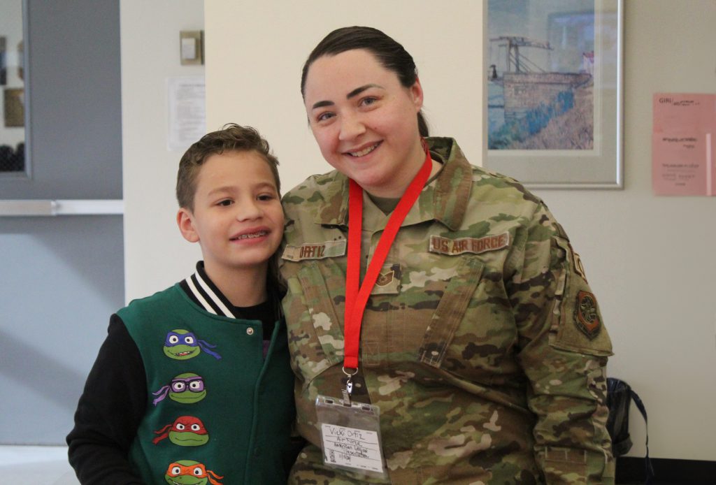 East Coldenham fourth grader Ryan Ortiz and his mom Vicky Ortiz who serves in the US Air National Guard at the EC Patriotism event on Nov. 15.